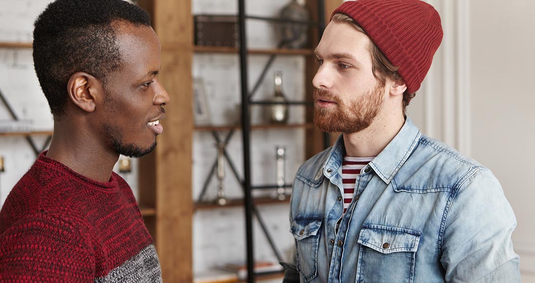 Two young men in conversation