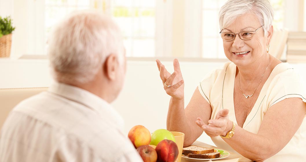 Mature couple talking and eye contact