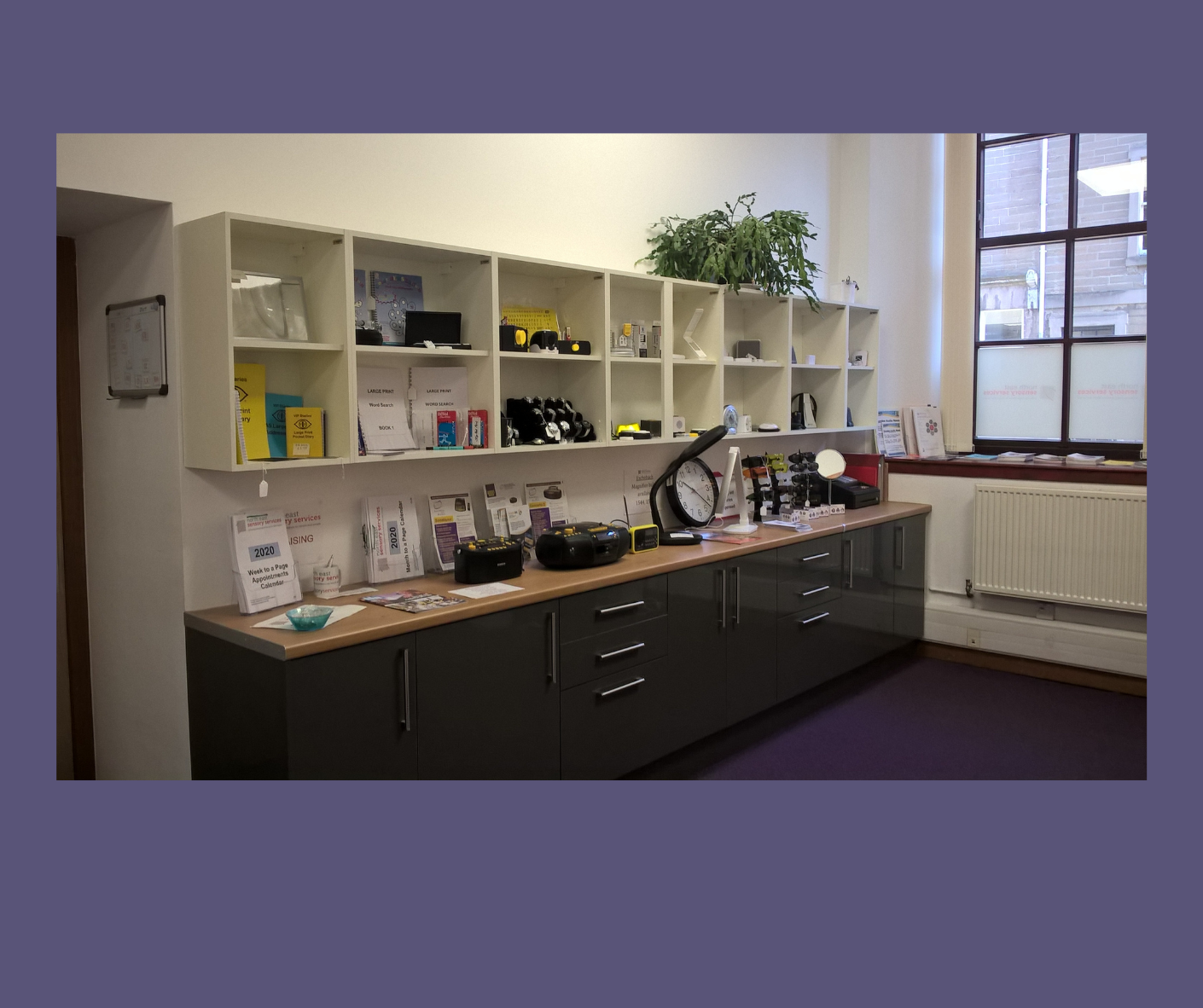 Shelves display a range of equipment and daily living aids in the Dundee Resource Centre