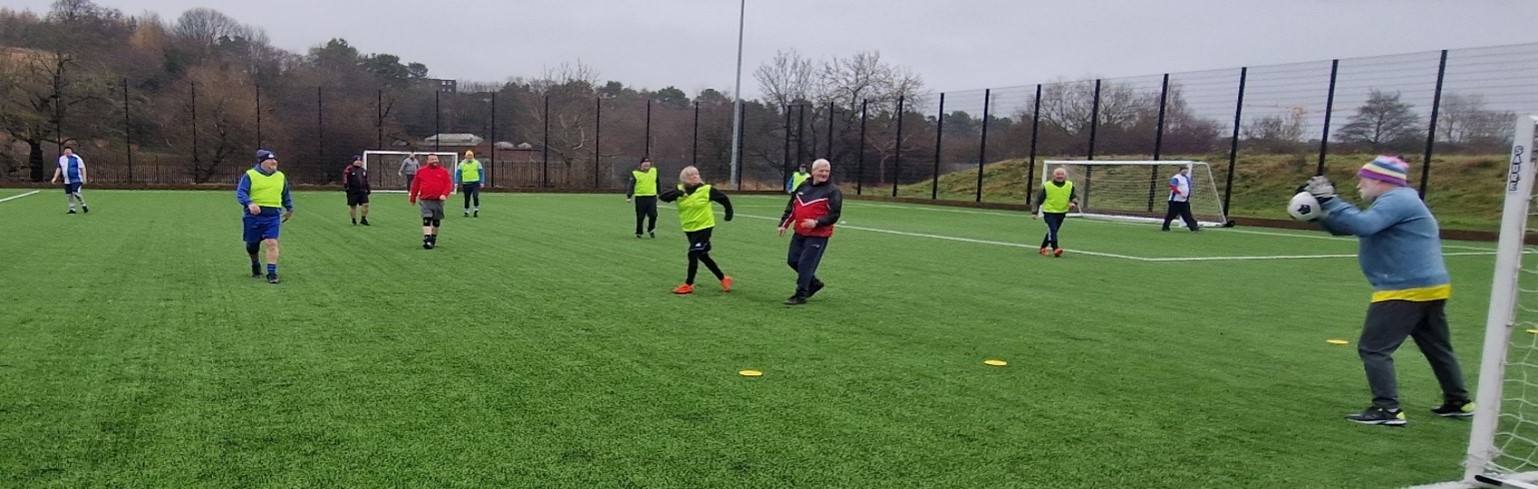 A group of people play walking football